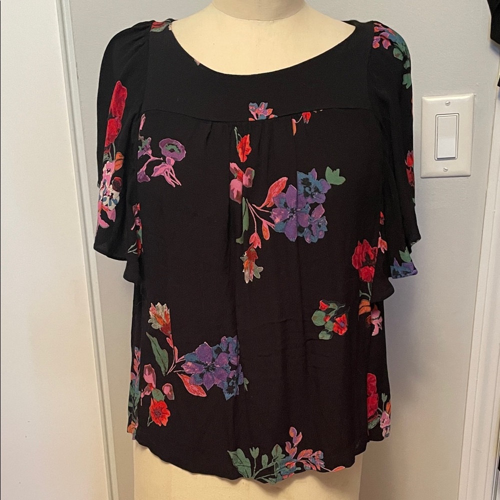 Maeve Black Blouse with Colorful Floral Design and flutter sleeves